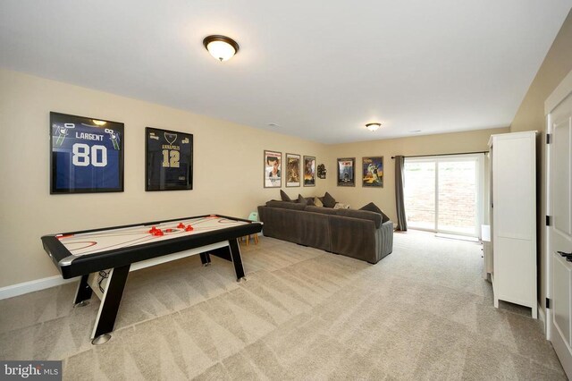  - game room with carpet floors and baseboards