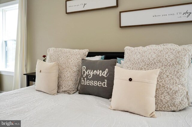  - bedroom with multiple windows