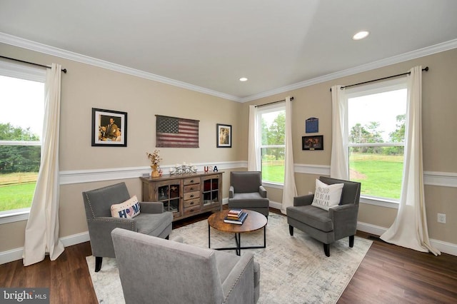  - living room featuring wood finished floors, plenty of natural light, baseboards, ornamental molding, and recessed lighting
