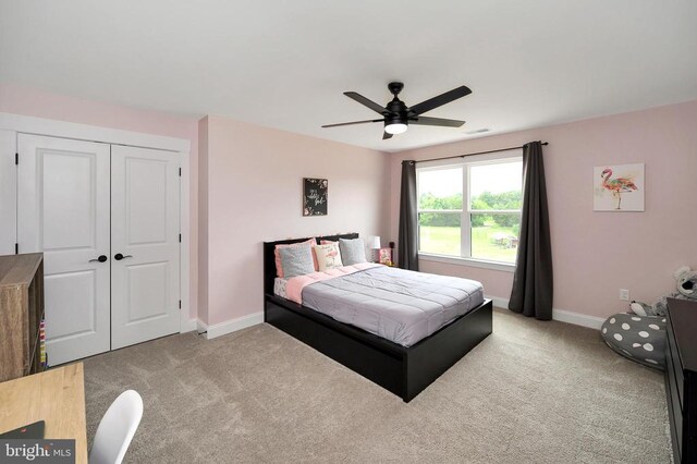  - bedroom featuring carpet floors, baseboards, a closet, and ceiling fan