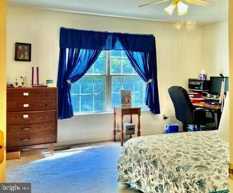 26 Magnolia Ct, Barboursville, VA 22923 - bedroom featuring a ceiling fan and a desk