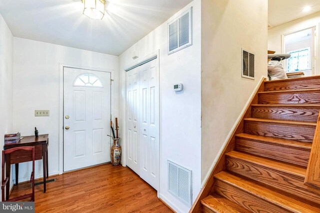 26 Magnolia Ct, Barboursville, VA 22923 - foyer featuring plenty of natural light, wood finished floors, stairway, and baseboards