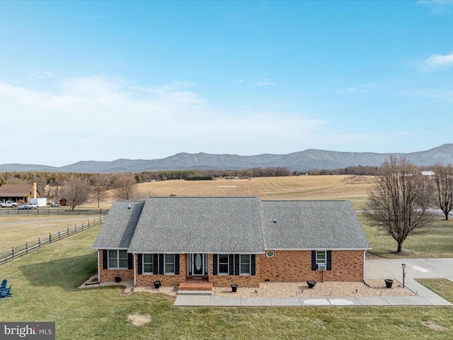 237 Preston Ln, Luray, VA 22835 - rear view of house with a mountain view, brick siding, and a view of rural / pastoral area