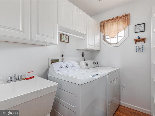 237 Preston Ln, Luray, VA 22835 - washroom with washing machine and dryer, cabinet space, wood finished floors, and baseboards