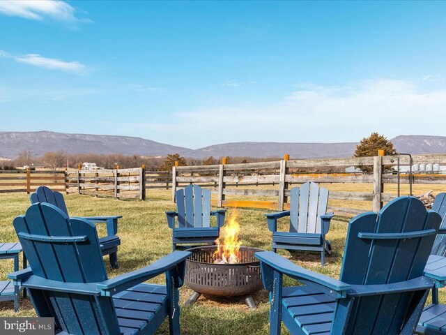 237 Preston Ln, Luray, VA 22835 - view of yard with an outdoor fire pit and a mountain view