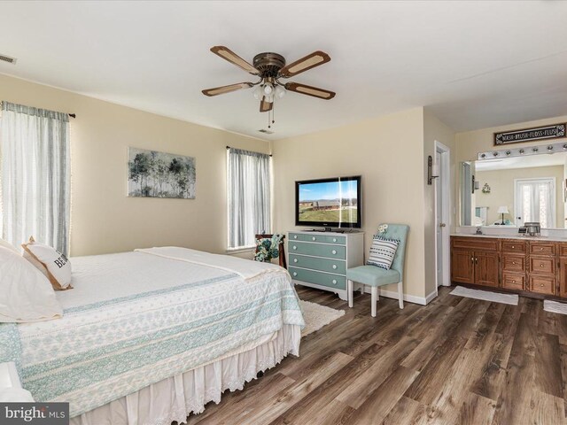 237 Preston Ln, Luray, VA 22835 - bedroom featuring dark wood-style flooring, baseboards, a ceiling fan, and ensuite bathroom