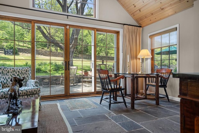  - sunroom with vaulted ceiling, french doors, and healthy amount of natural light