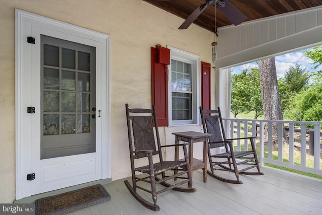  - wooden deck featuring ceiling fan