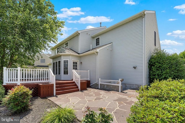 2703 Schumann St, Fredericksburg, VA 22408 - rear view of property featuring a patio area and a wooden deck