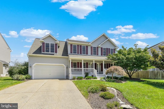 2703 Schumann St, Fredericksburg, VA 22408 - view of front facade with covered porch, concrete driveway, and a shingled roof