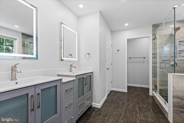 2703 Schumann St, Fredericksburg, VA 22408 - full bath featuring vanity, a shower stall, recessed lighting, and marble look tiles