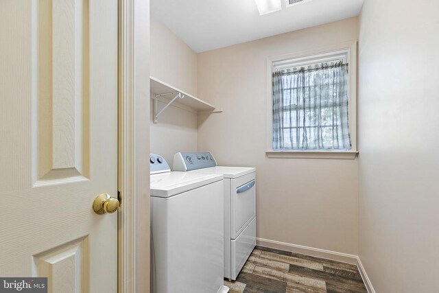 2703 Schumann St, Fredericksburg, VA 22408 - washroom with washing machine and dryer and wood finished floors