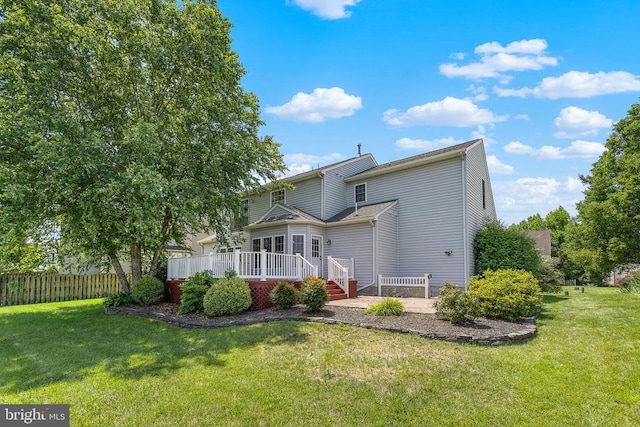 2703 Schumann St, Fredericksburg, VA 22408 - back of house featuring a wooden deck and a patio