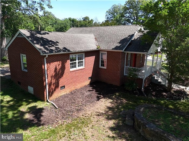 3200 Lafayette Blvd, Fredericksburg, VA 22408 - view of side of home with crawl space, roof with shingles, brick siding, and a lawn