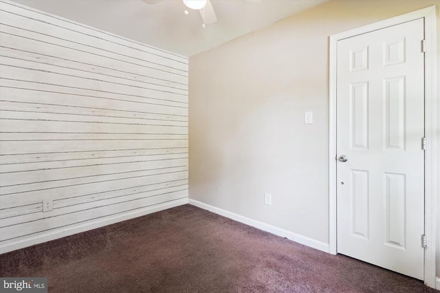 3200 Lafayette Blvd, Fredericksburg, VA 22408 - empty room with a ceiling fan, dark colored carpet, and wood walls
