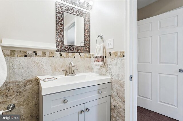 3200 Lafayette Blvd, Fredericksburg, VA 22408 - bathroom with vanity, tile walls, and a wainscoted wall