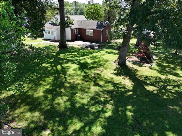 3200 Lafayette Blvd, Fredericksburg, VA 22408 - view of grassy yard with view of scattered trees and a patio area