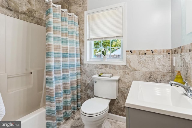3200 Lafayette Blvd, Fredericksburg, VA 22408 - bathroom with vanity, tile walls, and shower / tub combo