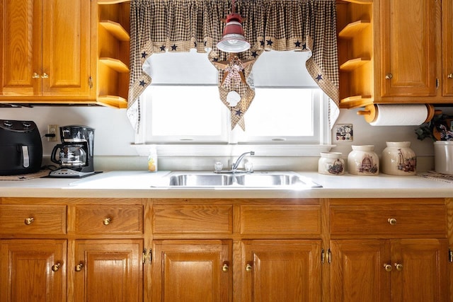 232 Edgewood Dr, Shenandoah, VA 22849 - kitchen featuring a sink, open shelves, light countertops, and brown cabinets