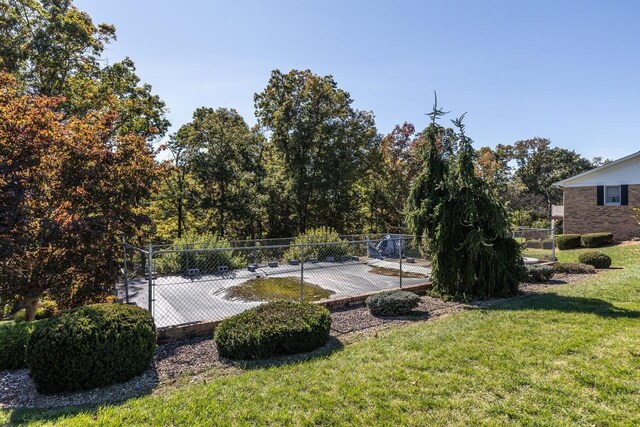 232 Edgewood Dr, Shenandoah, VA 22849 - view of yard featuring a patio and fence