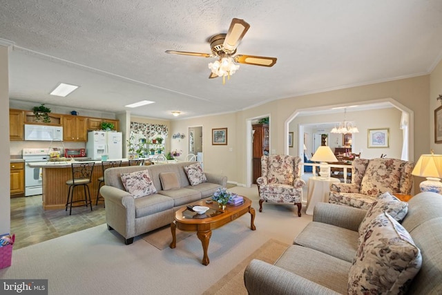 731 Bluewater Blvd S, Mineral, VA 23117 - living area with crown molding and ceiling fan with notable chandelier