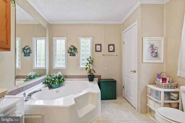 731 Bluewater Blvd S, Mineral, VA 23117 - full bath with ornamental molding, a garden tub, toilet, and tile patterned floors