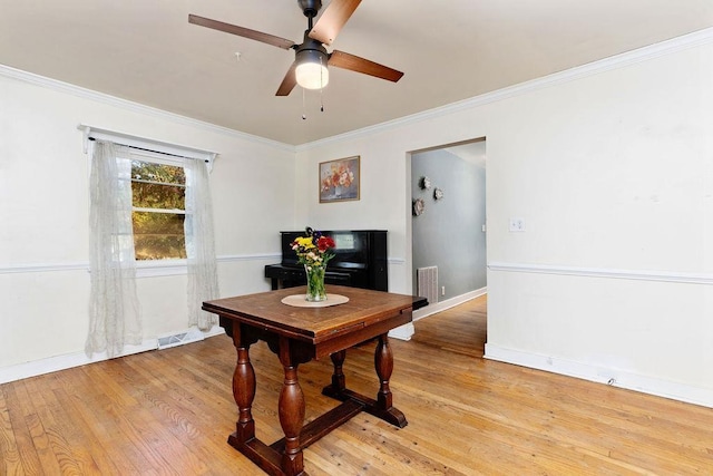 interior space featuring ornamental molding, ceiling fan, and light hardwood / wood-style floors