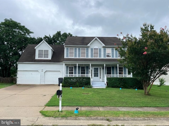 11607 River Meadows Way, Fredericksburg, VA 22408 - colonial house with covered porch, an attached garage, concrete driveway, and a front lawn