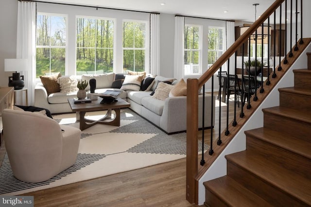 10100 N Streamview Ct, Fredericksburg, VA 22408 - living room with wood finished floors, stairway, and recessed lighting