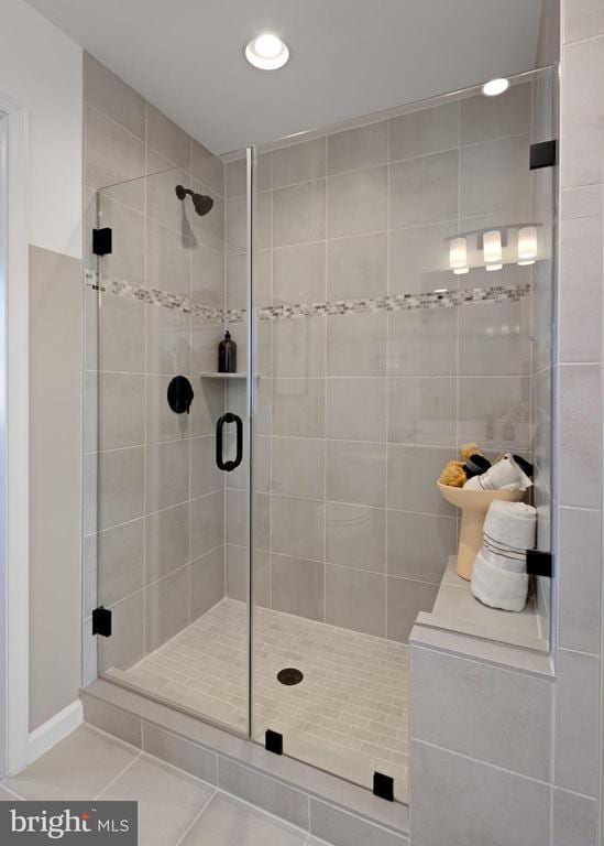 10100 N Streamview Ct, Fredericksburg, VA 22408 - bathroom featuring a stall shower, tile patterned floors, and recessed lighting