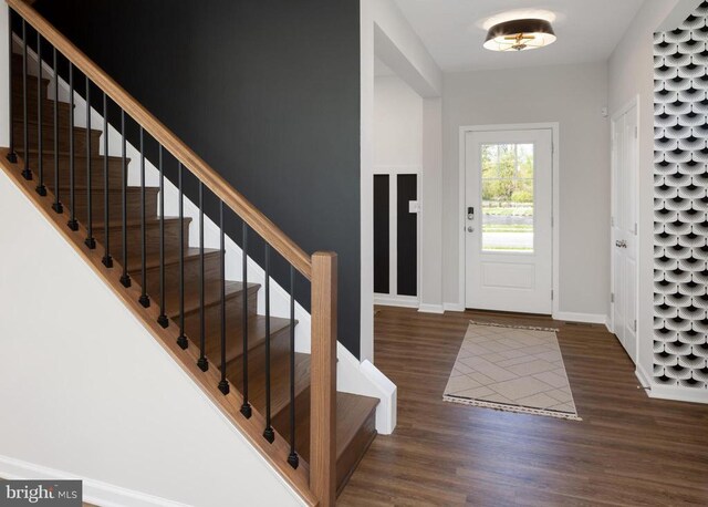 10100 N Streamview Ct, Fredericksburg, VA 22408 - foyer entrance featuring wood finished floors, stairs, and baseboards
