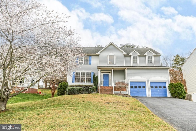 11218 Glen Park Dr, Fredericksburg, VA 22407 - traditional-style house featuring driveway, an attached garage, and a front yard