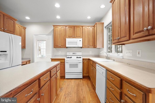 11218 Glen Park Dr, Fredericksburg, VA 22407 - kitchen with white appliances, a sink, light wood-type flooring, light countertops, and recessed lighting