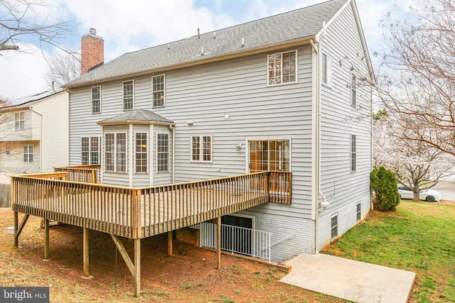 11218 Glen Park Dr, Fredericksburg, VA 22407 - back of house with a wooden deck and a chimney