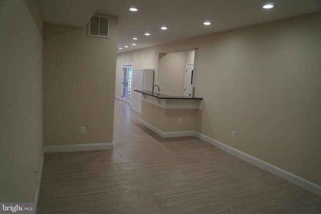 11218 Glen Park Dr, Fredericksburg, VA 22407 - unfurnished room featuring recessed lighting, baseboards, and wood finished floors