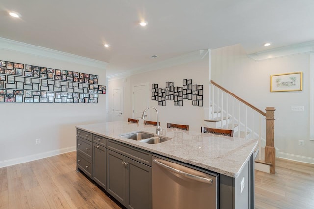237 Ridgeline Dr, Waynesboro, VA 22980 - kitchen with stainless steel dishwasher, a sink, gray cabinetry, ornamental molding, and light wood finished floors