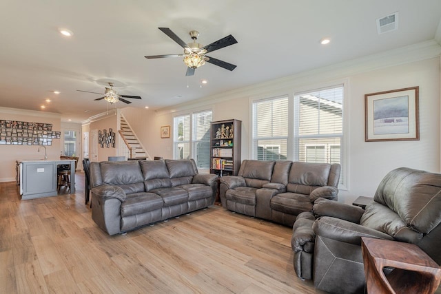 237 Ridgeline Dr, Waynesboro, VA 22980 - living area with crown molding, stairway, light wood finished floors, ceiling fan, and recessed lighting
