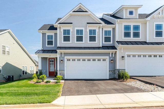 237 Ridgeline Dr, Waynesboro, VA 22980 - view of property featuring driveway, stone siding, and a standing seam roof
