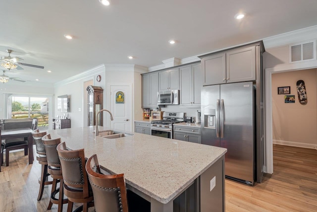 237 Ridgeline Dr, Waynesboro, VA 22980 - kitchen with appliances with stainless steel finishes, a sink, gray cabinetry, ceiling fan, and ornamental molding