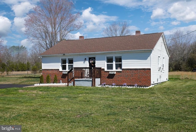 3321 Summit Crossing Rd, Fredericksburg, VA 22408 - view of front facade with brick siding, a chimney, and a front yard