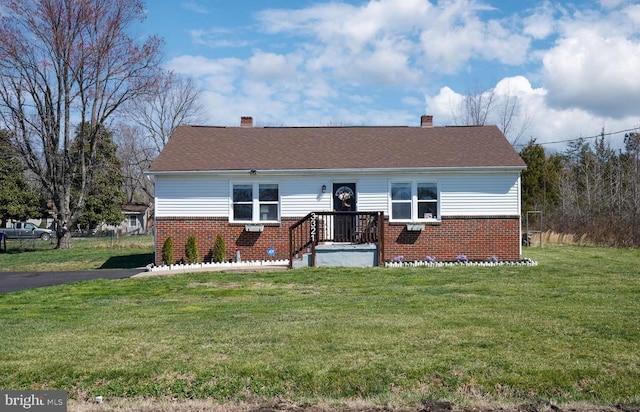 3321 Summit Crossing Rd, Fredericksburg, VA 22408 - view of front facade with brick siding, a chimney, and a front lawn