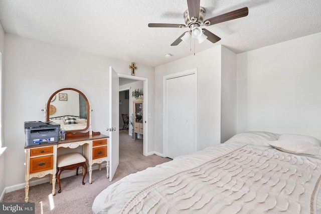 3321 Summit Crossing Rd, Fredericksburg, VA 22408 - bedroom with carpet flooring, a textured ceiling, a closet, and a ceiling fan