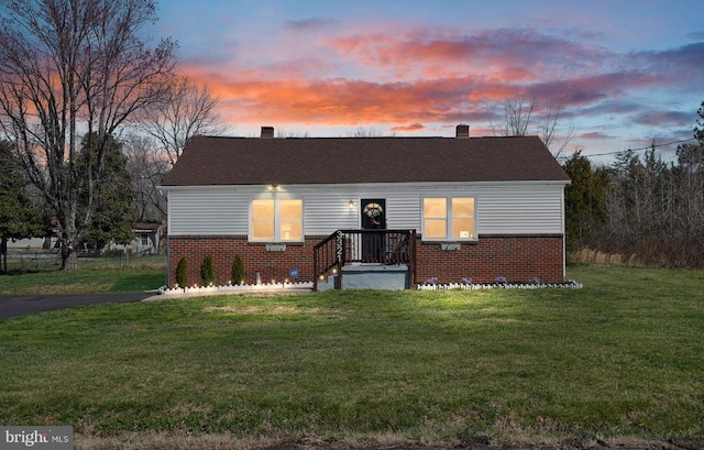 3321 Summit Crossing Rd, Fredericksburg, VA 22408 - view of front of home with brick siding, a front yard, and a chimney