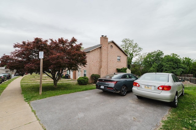 1331 Devon Ln, Harrisonburg, VA 22801 - view of home's exterior with a chimney and a lawn