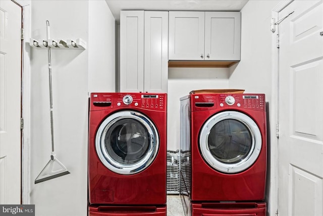 11311 Crown Ct, Fredericksburg, VA 22407 - laundry area featuring washing machine and clothes dryer and cabinet space