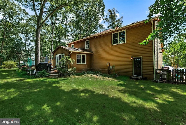11311 Crown Ct, Fredericksburg, VA 22407 - rear view of property featuring a yard
