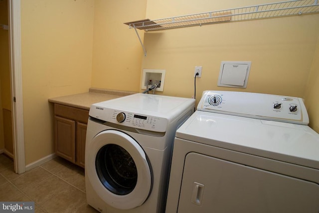 34194 Enchanted Way, Locust Grove, VA 22508 - washroom featuring independent washer and dryer, cabinet space, light tile patterned flooring, and baseboards