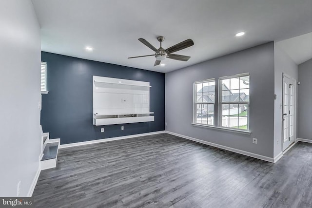  - spare room with wood finished floors, a ceiling fan, and recessed lighting