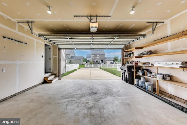  - garage featuring a garage door opener