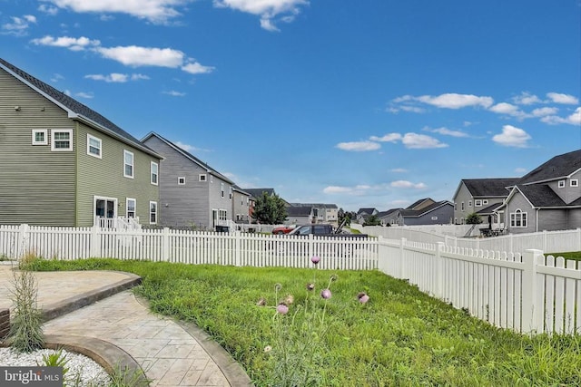  - view of yard featuring a residential view